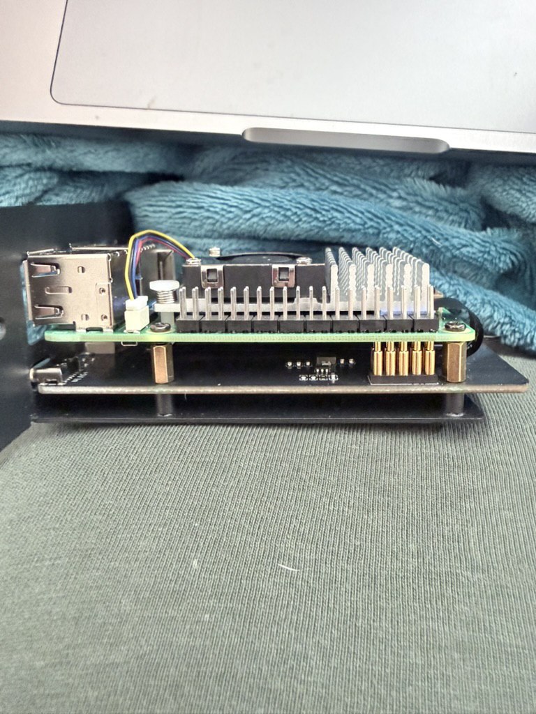 Side profile of Raspberry Pi assembly showing heatsink and stacked base setup.